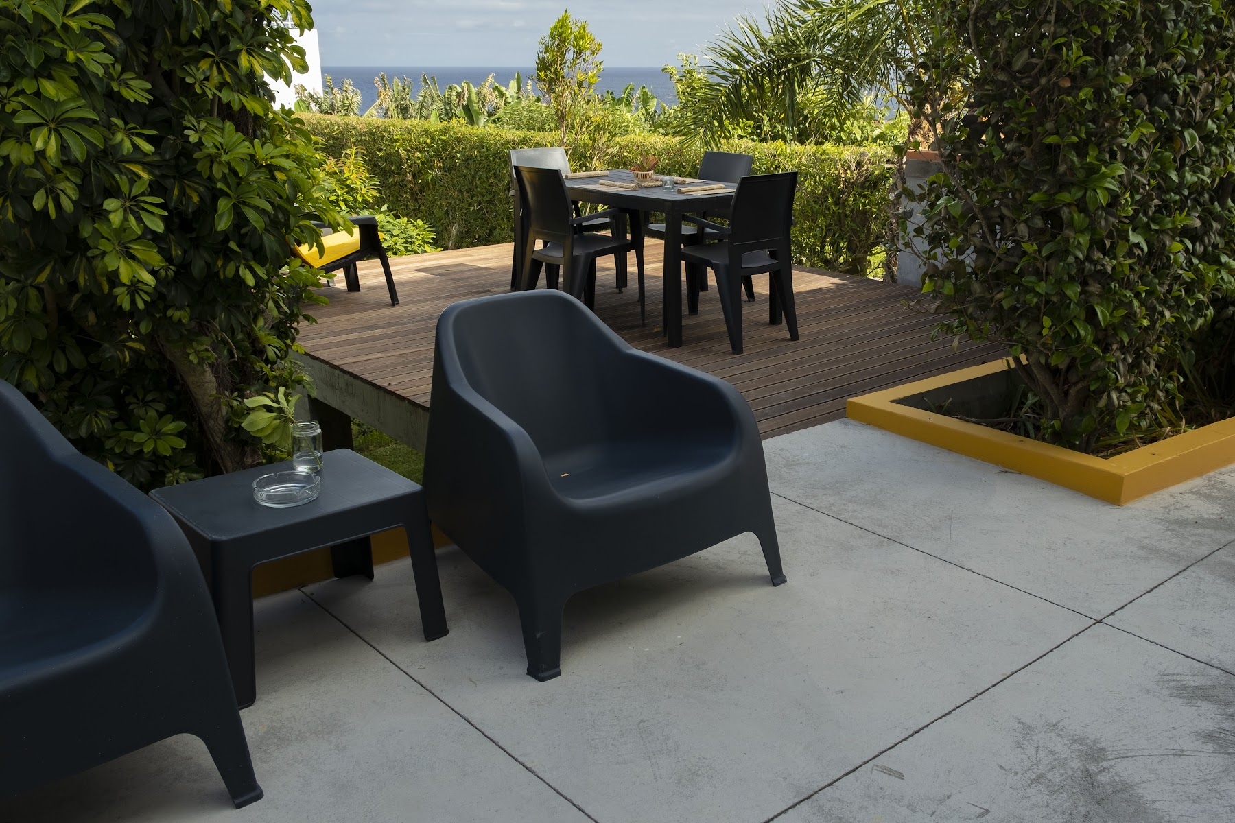 Garden terrace at Casa da Quinta with ocean in the distance